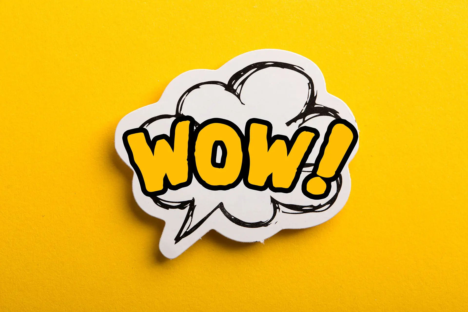 Facebook Stickers, this image shows a bright yellow background with a "wow" sticker - Facebook Stickers Concept