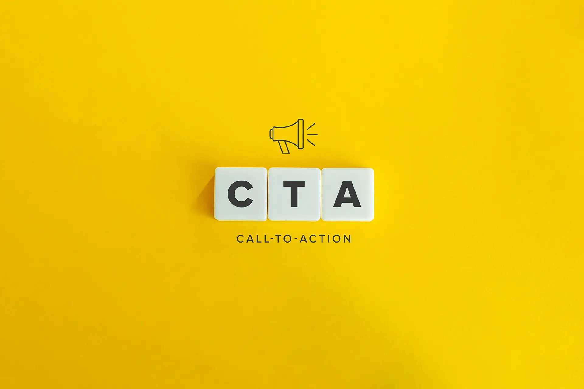 How to Write a Good Call to Action this graphic is placed on a vivid yellow background with a graphic of a megaphone and blocks with CTA under it - Call to action concept