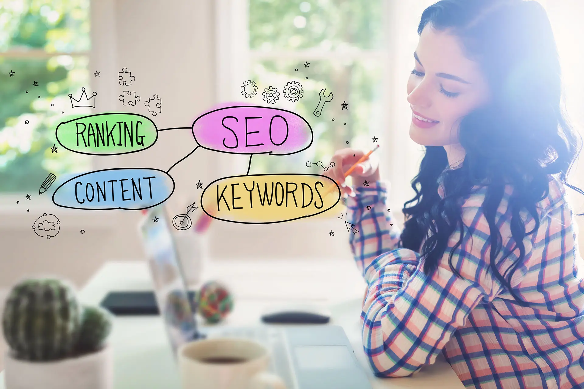 SEO Tips For Small Businesses, this image shows a lady sat at her laptop contemplating the super imposed words: seo, keywords, ranking and content