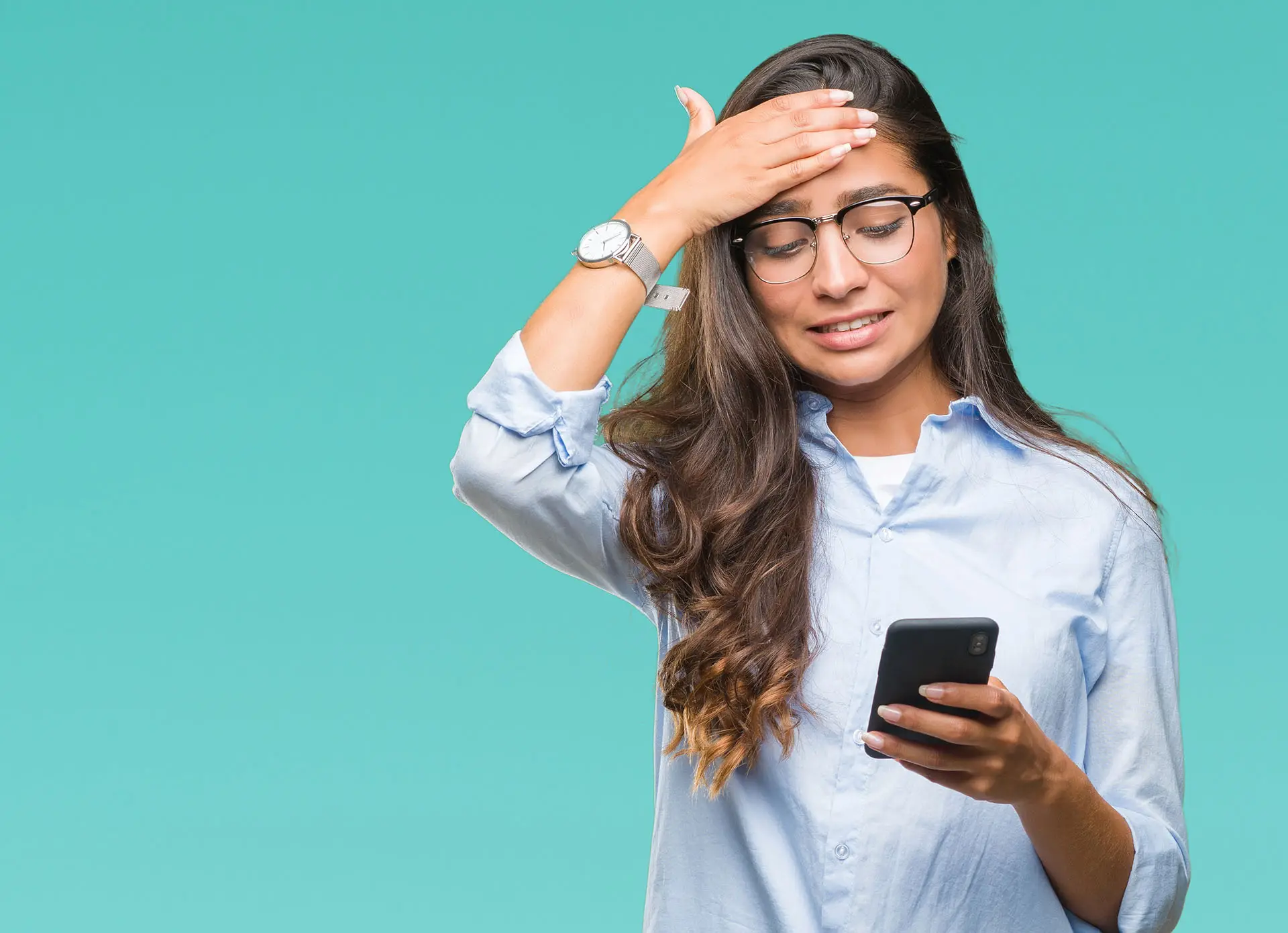 Understanding Features and Benefits the image shows a lady looking at her phone with her hand on her forehead looking worried - concept understaing the difference between features and benefits