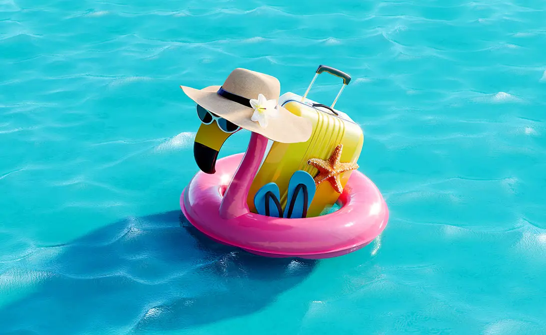 Why You Should Think Twice Before Posting Your Holiday Snaps! Image shows a turquoise blue pool with a pink flamingo inflatable wearing a sun hat with a yellow suitcase and flip flops