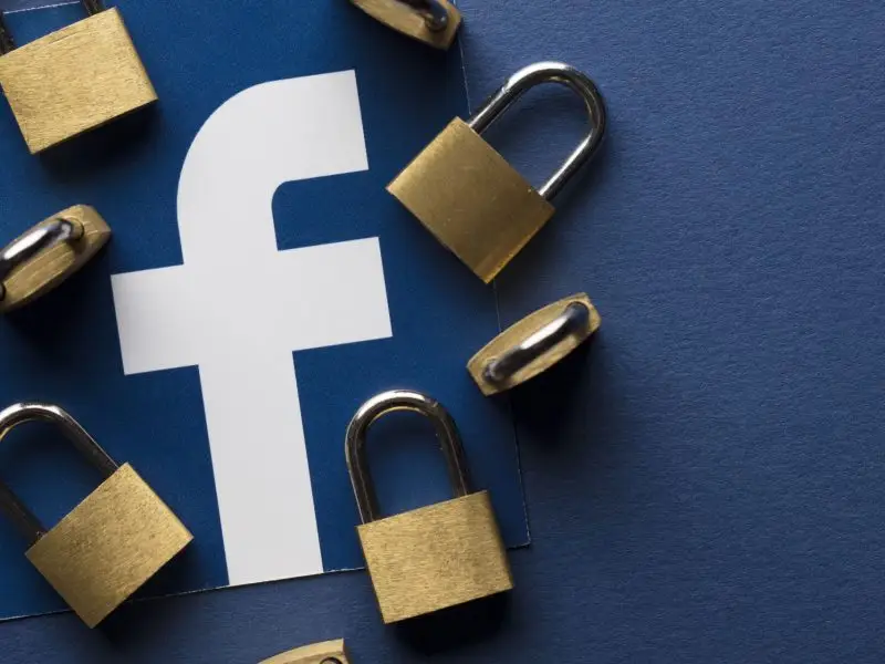 Brand Safety Tips for Facebook Ads - this image shows the Facebook F logo which is surrounded by padlocks - safety concept for facebook ads