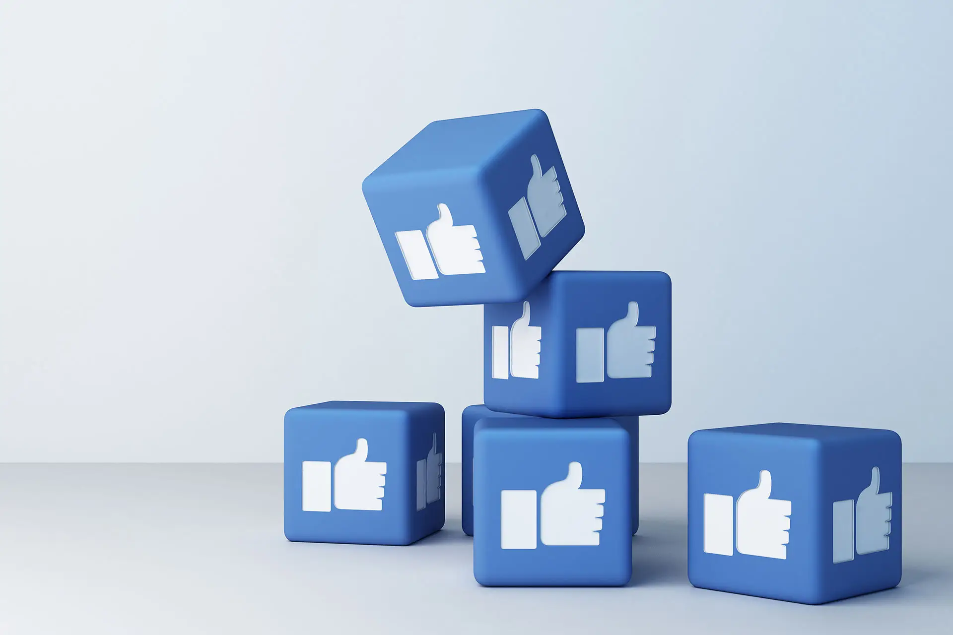 Facebook Gather - this image shows 5 cubes coloured blue with the Facebook thumb logo.