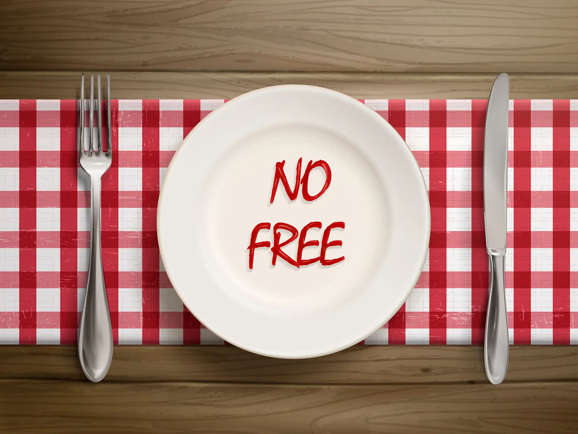 Something for Free? There Should Be No Such Thing! This image shows a dinner setting, a knife, fork and plate, on the plate written in ketchup are the words "no free"